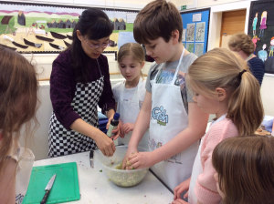 Burravoe Primary School Dumplings Bradley mixing fillings